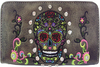 W500524PW - 7.5 x 4 x 1.5<br />Sugar skull w/rhinestones, colorful embroidery, 2 zipper comps, cc slots, pckts, wrist strap