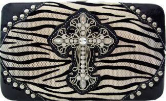 W500534SIL - 7.5 x 4.5 x .75<br />Shiny zebra print, rhinestone cross and studs, cc slots, checkbook, back snap pocket